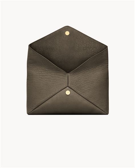 CASSANDRE large envelope pouch in lambskin .